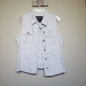 White denim vest.